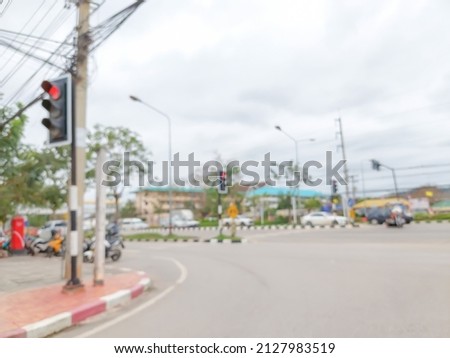 Abstract blurred photo of traffic lights and cars waiting for traffic lights