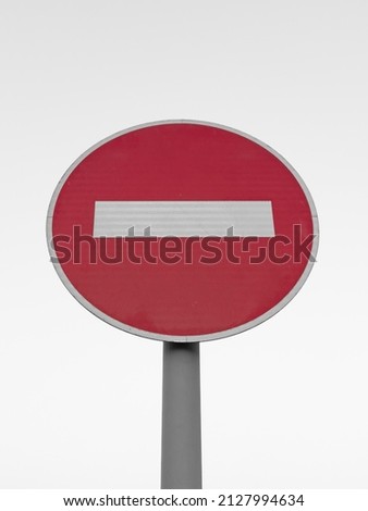 A no entry traffic sign post on a white background