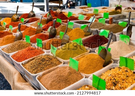 Spices and dry seasonings at the Carmel market in Tel Aviv. Close-up. Royalty-Free Stock Photo #2127994817