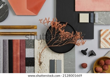 Creative flat lay composition with textile and paint samples, panels and tiles. Stylish interior designer moodboard. Pink, black and light grey color palette. Copy space. Template.  Royalty-Free Stock Photo #2128001669