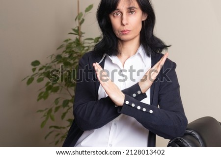 Crossed hands. Break the bias symbol of woman's international day. Woman arms crossed to show solidarity, commitment to calling out bias, breaking stereotypes, inequality, rejecting discrimination Royalty-Free Stock Photo #2128013402