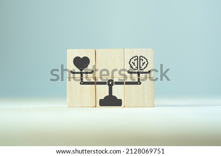 Balancing hard and soft skills concept. Training of skills Human resource management(HRM). wooden cubes with hard and soft skills on scales icon for comparison human skills. Grey background copy space Royalty-Free Stock Photo #2128069751