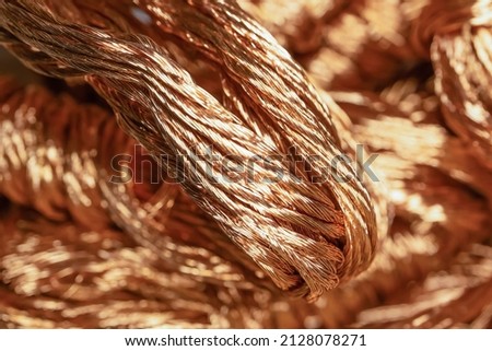 Piece of copper wire, waste, scrap metal. Royalty-Free Stock Photo #2128078271