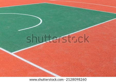Marking on the gum coating of a sports ground for playing basketball. Basketball marking lines background.