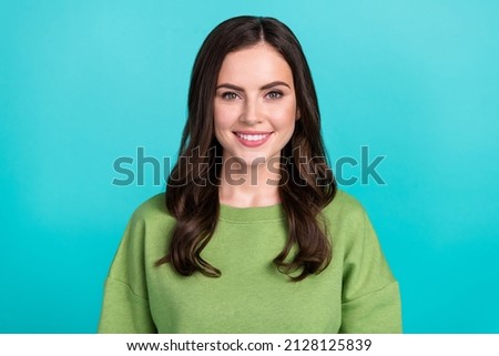 Photo of satisfied glad person toothy beaming smile look camera isolated on pastel teal color background