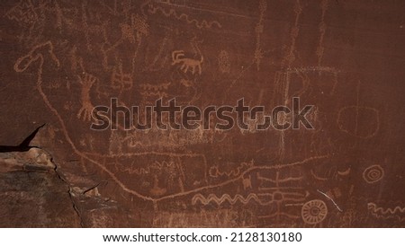 An ancient Native American Petroglyphs on Sandstone Rock in Valley of Fire State Park, Nevada
