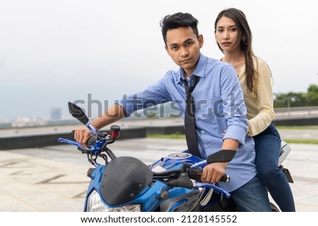 Relationship moment young couple on a bike