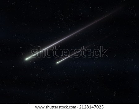 Two meteorites fly in the night sky. Bright meteors glow in the atmosphere. Beautiful shooting stars.  Royalty-Free Stock Photo #2128147025