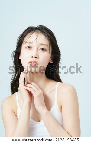 Beauty image of a young woman with good skin gloss Royalty-Free Stock Photo #2128153685