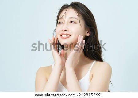 Beauty image of a young woman with good skin gloss Royalty-Free Stock Photo #2128153691