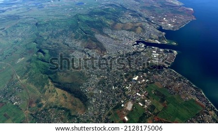 High altitude aerial view of Port Louis is capital city of Mauritius it is the country's economic cultural and political centre and most populous town 4k screenshot from animation