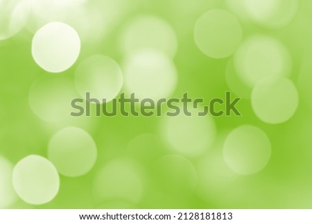 Abstract green bokeh background with lights (blurred)