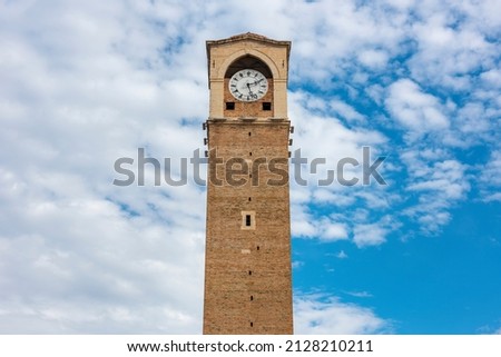 BUYUK SAAT KULESI (English: Great Clock Tower) is a historical clock tower in ADANA, TURKEY. Royalty-Free Stock Photo #2128210211