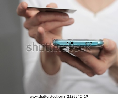 credit card purchasing woman shopping with a card with mobile phone with people stock photo 