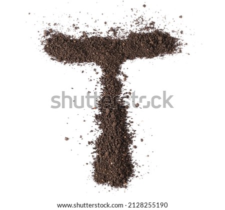 Dirt, alphabet letter T, soil isolated on white, clipping path
