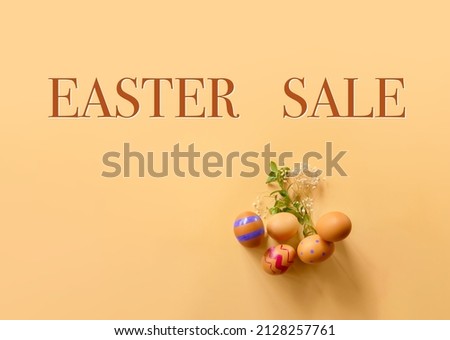 easter eggs with greenery, copy space for text, promo or message. easter greeting or sale concept. High quality photo