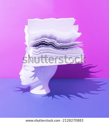 Human head with open book on blue and purple background. Surreal, education, study and knowledge concept