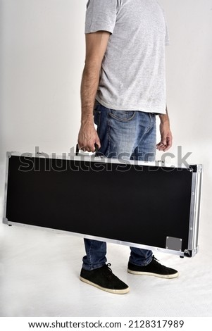 hard case for musical instruments, photo with details and blurred dots isolated on white background