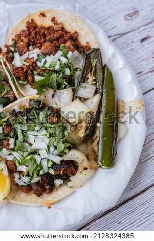 Chorizo and Al Pastor Tacos on Plate