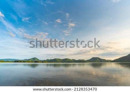 Mountain landscape, picturesque mountain lake in the summer morning, Beauty of nature concept background. lake and mountain on background in the morning time. natural landscape in Thailand. Royalty-Free Stock Photo #2128353470