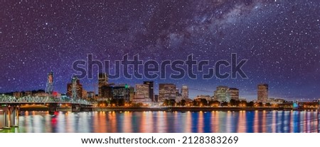 Starry night over Portland, Oregon. City skyline with stars.