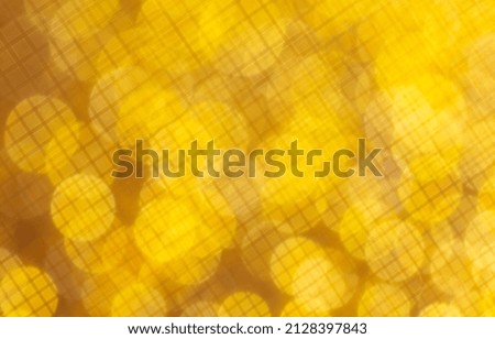 Golden bokeh as an abstract background. Texture