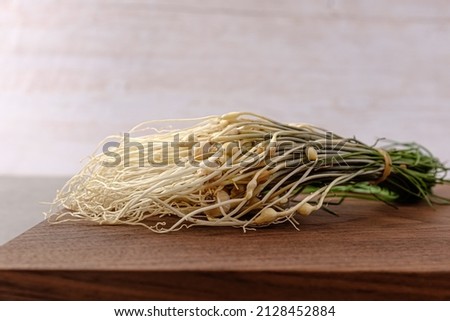 Strong scent and elongated wild chive Royalty-Free Stock Photo #2128452884