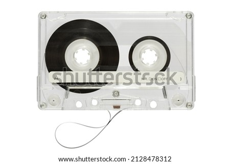 Vintage audio cassette tape with transparent plastic case and black tape on reels isolated on white background in light studio Royalty-Free Stock Photo #2128478312