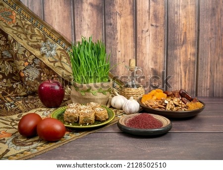 Festive table in honor of Navruz. Wheat with a red ribbon, the traditional holiday of the vernal equinox Nawruz.