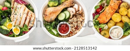 Healthy meal prep in lunch boxes on light background. Dieting eating concept. Flat lay, top view, panorama