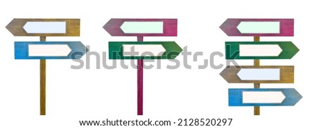collection of pointers with arrows isolated on white background.Colorful wooden direction arrow signs on a wooden pole. copy space.