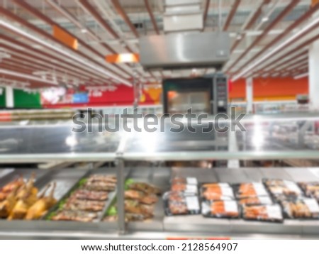 blur of supermarket The atmosphere in the supermarket, food freezer zone.