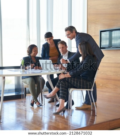 The best way to get it done is together. Shot of corporate businesspeople meeting in the boardroom.