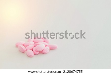 pink pills for medical treatment isolated on white
