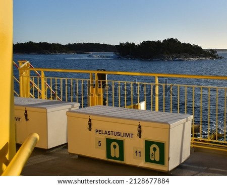 Public ferry named Aurora, in the archipelago in Finland outside Kasnäs, in the muncipality Kimitoon, Kemiönsaari, Kimito ön. translation for the text on the picture: lifepreservers. 