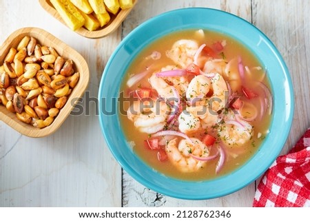 Ecuadorian shrimp ceviche, a traditional appetizer. On a white wooden table. Royalty-Free Stock Photo #2128762346