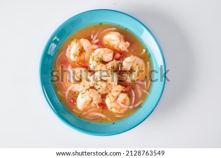 Ecuadorian shrimp ceviche, a traditional appetizer. On a white background.  Royalty-Free Stock Photo #2128763549