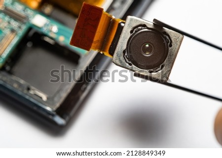 camera modules being used in mobile phones. development of mobile cameras. Digital camera lens part. sensor and technology smartphone new high resolution cameras. Mobile phone camera module