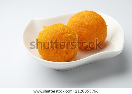 Indian Sweet Motichoor laddoo Also Know as Bundi Laddu or Motichur Laddoo Are Made of Very Small Gram Flour Balls or Boondis Which Are Deep Fried Royalty-Free Stock Photo #2128853966