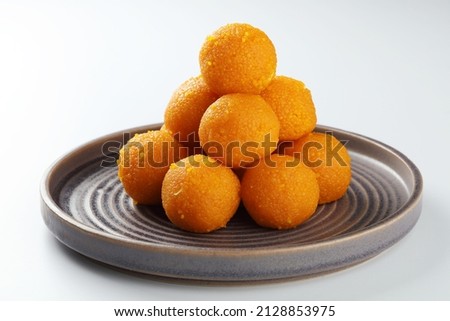 Indian Sweet Motichoor laddoo Also Know as Bundi Laddu or Motichur Laddoo Are Made of Very Small Gram Flour Balls or Boondis Which Are Deep Fried Royalty-Free Stock Photo #2128853975