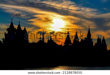 Silhouette of a fairytale castle at dawn