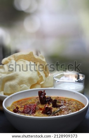 Khichdi  or masala khichdi is Indian traditonal meal made with moong dal and rice.selective focus. Royalty-Free Stock Photo #2128909373