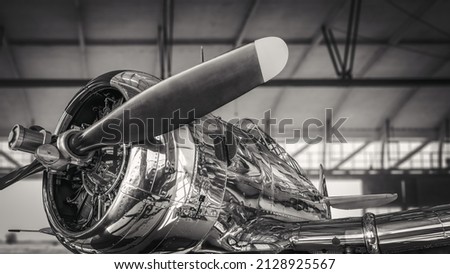 historical aircraft in a hangar Royalty-Free Stock Photo #2128925567
