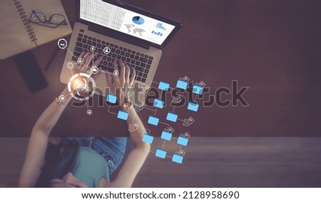 Businesswoman share, backup, download, upload, manage data.
Document management concept on smartphones and laptops. Huge online document database Royalty-Free Stock Photo #2128958690