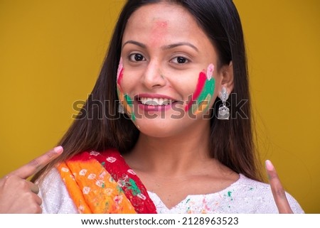 Young Indian women celebrating holi 