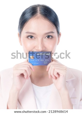 Business Asian woman showing credit card for payment shopping online , paying by credit card online shopping  e-commerce telemarketing concept 