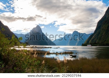 Mitre Peak Milford Sound New Zealand, cruise boat between the fiords Royalty-Free Stock Photo #2129037596