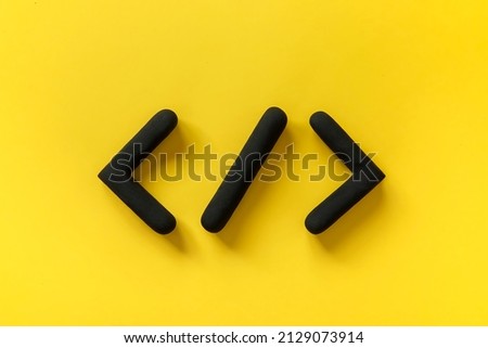 Coding language development icon on yellow background. Software development concept. Programming code browser symbol, 3d sign website coding. Royalty-Free Stock Photo #2129073914