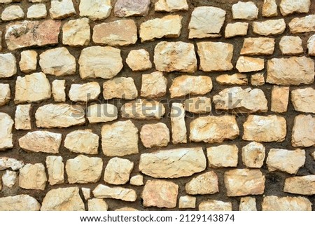 Texture of a wall made with large stones