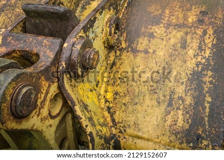Shovel connection on an old digger machine.